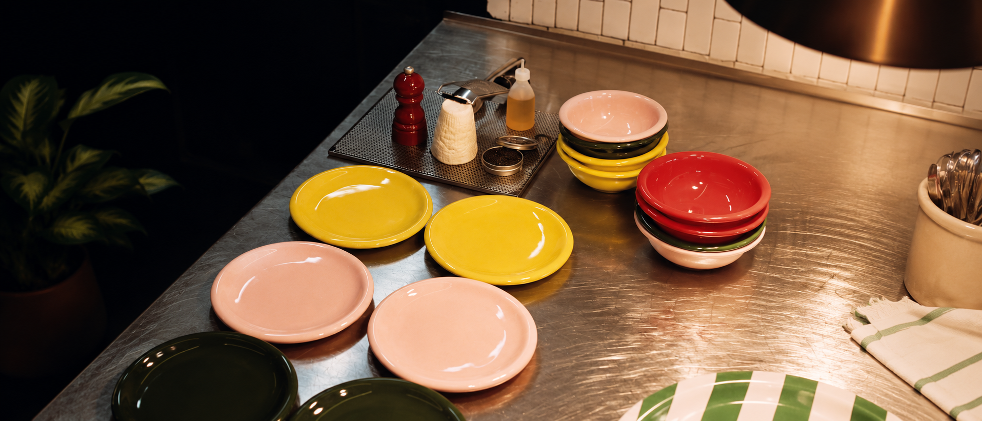 Colorful dinnerware arranged in a bright modern kitchen